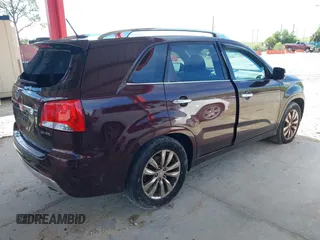 2012 Kia Sorento SX with VIN 5XYKW4A24CG207956, listed as a IAAI auction lot 40244776 with 112,703 mi miles. Bid and sale history available at carsss.com. Image 4.