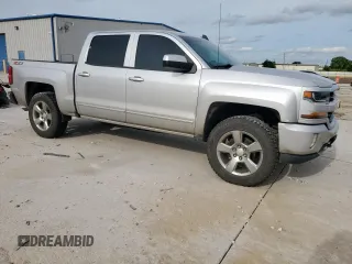 2018 Chevrolet Silverado 1500 LT with VIN 3GCUKREC3JG462083, listed as a Copart auction lot 56346705 with 166,454 mi miles and Clean Title. Bid and sale history available at DreamBid. Image 4.