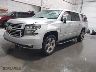 2017 Chevrolet Suburban Premier with VIN 1GNSKJKC0HR179235, listed as a IAAI auction lot 41301181 with 131,698 mi miles. Bid and sale history available at carsss.com. Image 2.