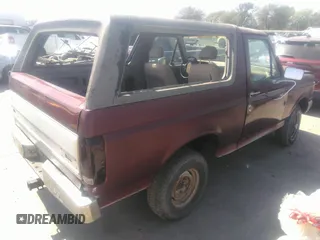 1990 Ford Bronco XL with VIN 1FMEU15N7LLA25223, listed as a IAAI auction lot 41858217 with 196,000 mi miles. Bid and sale history available at carsss.com. Image 4.