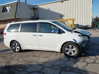 2014 Toyota Sienna LE AAS with VIN 5TDKK3DC2ES483679, listed as a IAAI auction lot 41547261 with 142,697 mi miles. Bid and sale history available at carsss.com. Image 14.