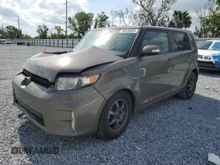 2014 Scion xB z VIN JTLZE4FE5EJ061689, wystawiony jako Copart lot #55420885 z przebiegiem 96 970 mil mil oraz Szkody całkowita. Historia ofert i sprzedaży dostępna na DreamBid. Obrazek 1.