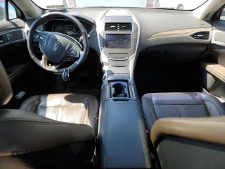 2013 Lincoln MKZ z VIN 3LN6L2J90DR818503, wystawiony jako Copart lot #54716715 z przebiegiem 114 227 mil mil oraz Szkody całkowita. Historia ofert i sprzedaży dostępna na DreamBid. Obrazek 8.
