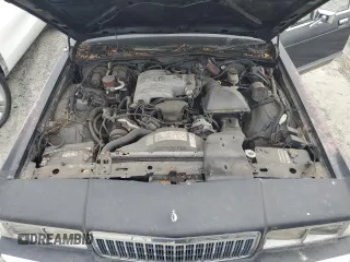 1988 Mercury Grand Marquis GS z VIN 2MEBM74F3JX707373, wystawiony jako Copart lot #53880905 z przebiegiem 5540 mil mil oraz Tytuł czysty. Historia ofert i sprzedaży dostępna na DreamBid. Obrazek 11.