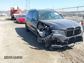 2020 BMW X7 xDrive40i with VIN 5UXCW2C03L9A01096, listed as a IAAI auction lot 41774774 with 55,596 mi miles. Bid and sale history available at carsss.com. Image 1.