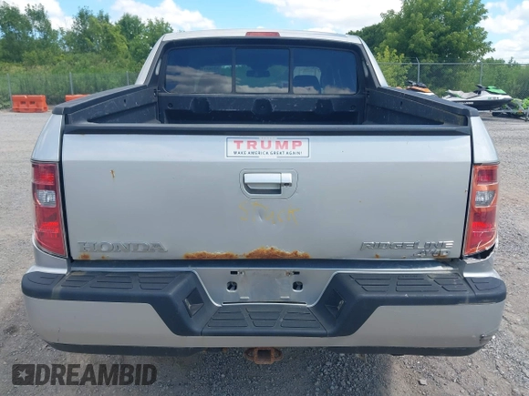 2013 Honda Ridgeline RTL with VIN 5FPYK1F51DB007236, listed as a IAAI auction lot 42762126 with 201,758 mi miles and . Bid and sale history available at DreamBid. Image 16.