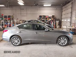 2015 Infiniti Q50 Premium with VIN JN1BV7AR6FM398836, listed as a IAAI auction lot 41836719 with 57,804 mi miles. Bid and sale history available at carsss.com. Image 12.