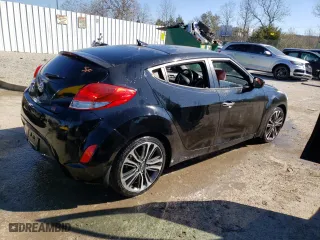 2014 Hyundai Veloster with VIN KMHTC6AD3EU214565, listed as a Copart auction lot 74543553 with 116,050 mi miles and Salvage Title. Bid and sale history available at carsss.com. Image 3.