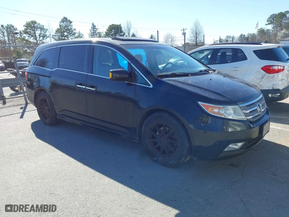 2013 Honda Odyssey Touring with VIN 5FNRL5H99DB076385, listed as a IAAI auction lot 41751504 with 233,875 mi miles. Bid and sale history available at carsss.com. Image 1.