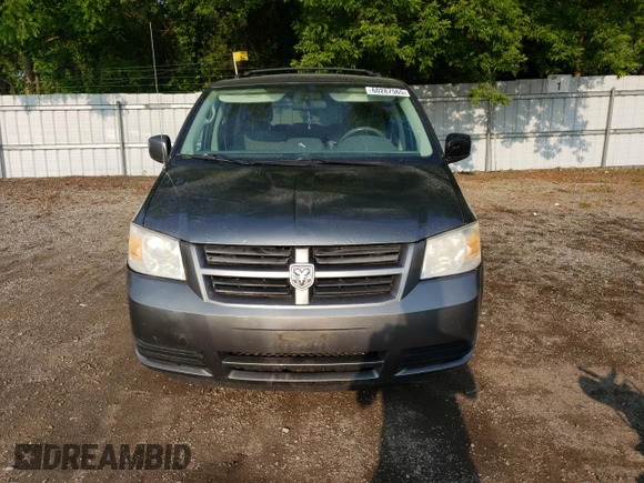 2009 Dodge Grand Caravan SE with VIN 2D8HN44E29R694728, listed as a Copart auction lot 60287565 with 233,018 mi miles and Clean title. Bid and sale history available at DreamBid. Image 5.