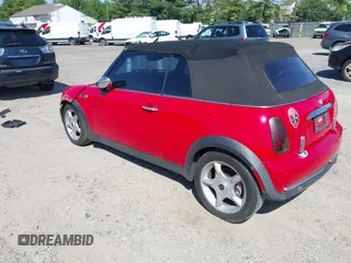 2005 MINI Convertible with VIN WMWRF33445TF62043, listed as a IAAI auction lot 42279363 with 173,067 mi miles and . Bid and sale history available at DreamBid. Image 3.