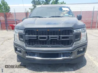 2018 Ford F-150 XL with VIN 1FTEW1CPXJKD56562, listed as a IAAI auction lot 42588371 with 137,496 mi miles and . Bid and sale history available at DreamBid. Image 6.