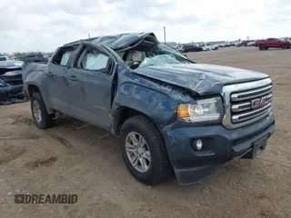 2019 GMC Canyon 2WD SLE with VIN 1GTG5CEN5K1209642, listed as a IAAI auction lot 41493593 with 57,697 mi miles. Bid and sale history available at carsss.com. Image 1.