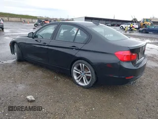 2013 BMW 3 Series 328i with VIN WBA3C1G52DNN93443, listed as a IAAI auction lot 41511247 with 121,254 mi miles and . Bid and sale history available at DreamBid. Image 3.