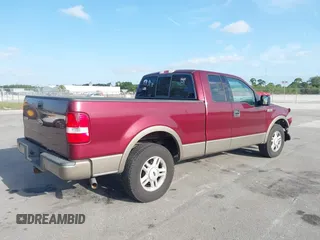 2004 Ford F-150 XL with VIN 1FTPX12544NA71834, listed as a IAAI auction lot 42085768 with 90,902 mi miles. Bid and sale history available at carsss.com. Image 4.