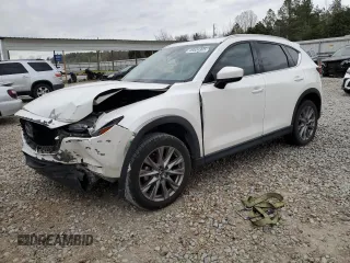 2021 Mazda CX-5 Grand Touring with VIN JM3KFBDM2M1436789, listed as a Copart auction lot 49534305 with 65,790 mi miles and Salvage Title. Bid and sale history available at carsss.com. Image 1.