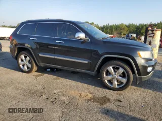 2011 Jeep Grand Cherokee Overland with VIN 1J4RS6GT5BC648076, listed as a Copart auction lot 48878135 with 223,263 mi miles and Salvage Title. Bid and sale history available at DreamBid. Image 4.