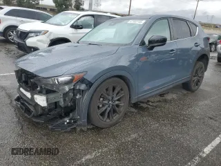2021 Mazda CX-5 Touring with VIN JM3KFACM3M0420425, listed as a Copart auction lot 47993745 with 56,184 mi miles and Salvage Title. Bid and sale history available at carsss.com. Image 1.