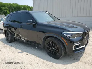 2020 BMW X5 sDrive40i with VIN 5UXCR4C01L9C26104, listed as a Copart auction lot 59191565 with 62,852 mi miles and Clean title. Bid and sale history available at DreamBid. Image 4.