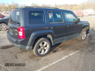 2014 Jeep Patriot Latitude with VIN 1C4NJRFB4ED720241, listed as a IAAI auction lot 40914199 with 128,218 mi miles. Bid and sale history available at carsss.com. Image 4.
