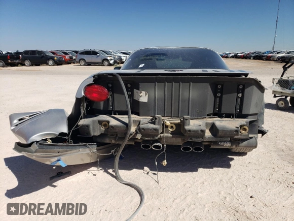2004 Chevrolet Corvette with VIN 1G1YY22G945102769, listed as a Copart auction lot 74500664 with 64,718 mi miles and Salvage Title. Bid and sale history available at carsss.com. Image 6.