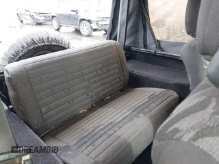1995 Jeep Wrangler S with VIN 1J4FY19P0SP258399, listed as a IAAI auction lot 41970320 with 151,621 mi miles. Bid and sale history available at carsss.com. Image 8.