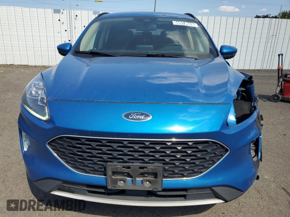 2020 Ford Escape Titanium z VIN 1FMCU9J90LUB15564, wystawiony jako Copart lot #59673625 z przebiegiem 84 474 mil mil oraz Czysty tytuł • Clean title. Historia ofert i sprzedaży dostępna na DreamBid. Obrazek 5.