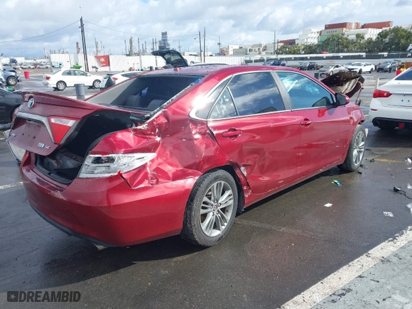 2015 Toyota Camry Hybrid LE with VIN 4T1BD1FK7FU155931, listed as a IAAI auction lot 41794523 with 90,730 mi miles. Bid and sale history available at carsss.com. Image 4.