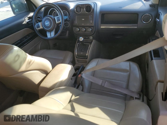 2012 Jeep Patriot Limited with VIN 1C4NJPCB4CD526444, listed as a Copart auction lot 82899834 with 127,220 mi miles and Salvage title. Bid and sale history available at DreamBid. Image 8.