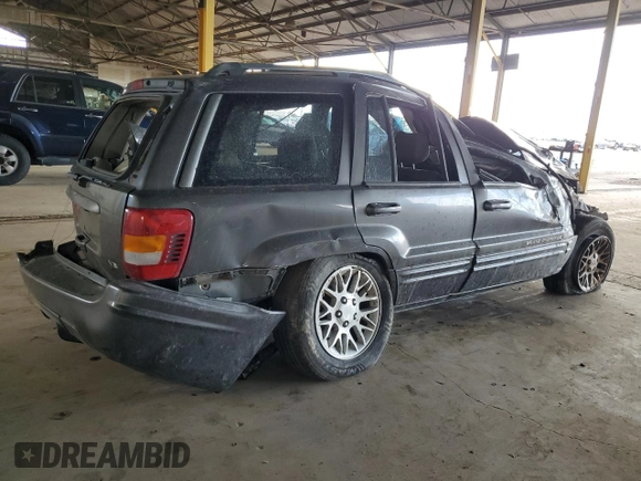 2002 Jeep Grand Cherokee Limited with VIN 1J8GX58N72C294837, listed as a Copart auction lot 56201145 with 218,345 mi miles and Salvage Title. Bid and sale history available at DreamBid. Image 3.