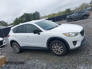 2015 Mazda CX-5 Touring with VIN JM3KE2CY4F0436664, listed as a IAAI auction lot 41876238 with 374,305 mi miles. Bid and sale history available at carsss.com. Image 13.
