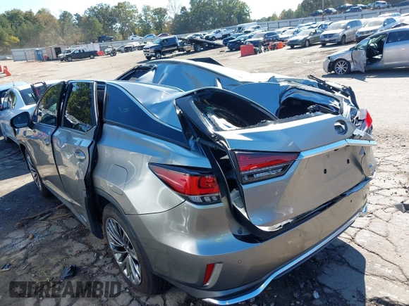 2020 Lexus RX with VIN JTJJGKFA7L2013877, listed as a IAAI auction lot 40678497 with 67,271 mi miles. Bid and sale history available at carsss.com. Image 17.