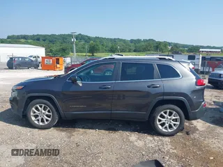 2016 Jeep Cherokee Latitude with VIN 1C4PJLCB1GW113585, listed as a IAAI auction lot 42457964 with 92,736 mi miles and . Bid and sale history available at DreamBid. Image 14.