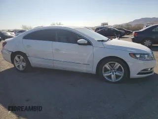 2014 Volkswagen CC Sport with VIN WVWBN7AN7EE501362, listed as a Copart auction lot 73544044 with 228,140 mi miles and Salvage Title. Bid and sale history available at carsss.com. Image 4.
