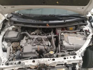 2014 Toyota Prius One z VIN JTDKDTB33E1558853, wystawiony jako Copart lot #57339425 z przebiegiem Nie podano mil oraz Nie do naprawy • Non repairable. Historia ofert i sprzedaży dostępna na DreamBid. Obrazek 11.