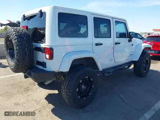 2012 Jeep Wrangler Unlimited Sahara with VIN 1C4BJWEG2CL117080, listed as a IAAI auction lot 41868590 with 92,475 mi miles. Bid and sale history available at carsss.com. Image 4.