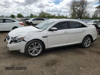 2013 Ford Taurus SEL z VIN 1FAHP2H83DG115537, wystawiony jako Copart lot #56741725 z przebiegiem 266 849 mil mil oraz Szkody całkowita. Historia ofert i sprzedaży dostępna na DreamBid. Obrazek 1.