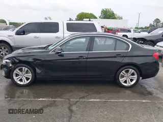 2018 BMW 3 Series 330i xDrive with VIN WBA8D9G50JNU69376, listed as a IAAI auction lot 41971138 with 61,551 mi miles. Bid and sale history available at carsss.com. Image 14.