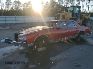 1987 Chevrolet Caprice Classic z VIN 1G1BN51H9HX113226, wystawiony jako Copart lot #87006324 z przebiegiem 177 611 mil mil oraz Nie do naprawy • Non repairable. Historia ofert i sprzedaży dostępna na DreamBid. Obrazek 1.