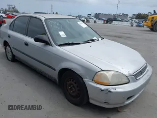 1997 Honda Civic LX z VIN 2HGEJ6670VH522898, wystawiony jako IAAI lot #42118738 z przebiegiem 227 977 mil mil oraz . Historia ofert i sprzedaży dostępna na DreamBid. Obrazek 1.
