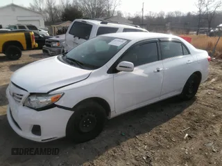 2013 Toyota Corolla L with VIN 2T1BU4EE0DC121177, listed as a IAAI auction lot 41759228 with 129,289 mi miles. Bid and sale history available at carsss.com. Image 2.