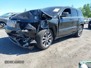 2017 Jeep Grand Cherokee Overland with VIN 1C4RJFCG0HC844713, listed as a IAAI auction lot 42293301 with 83,791 mi miles and . Bid and sale history available at DreamBid. Image 2.