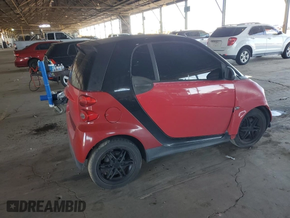 2013 Smart fortwo Pure with VIN WMEEJ3BA2DK663995, listed as a Copart auction lot 54629895 with Not Provided miles and Salvage Title. Bid and sale history available at DreamBid. Image 3.