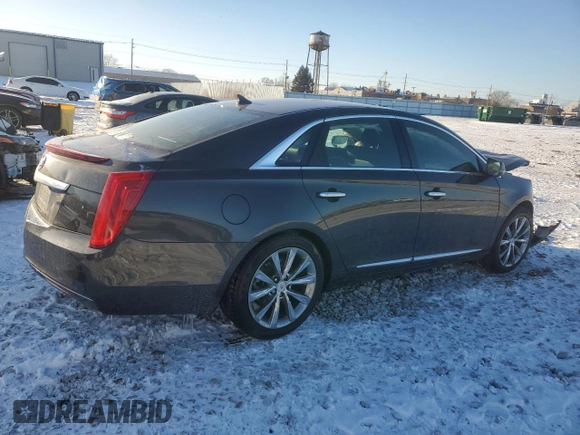 2014 Cadillac XTS with VIN 2G61L5S37E9185986, listed as a Copart auction lot 45142685 with 61,940 mi miles and Salvage Title. Bid and sale history available at carsss.com. Image 3.
