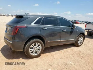 2020 Cadillac XT5 Luxury FWD z VIN 1GYKNAR47LZ173823, wystawiony jako Copart lot #56770025 z przebiegiem 74 192 mil mil oraz Szkoda całkowita • Salvage title. Historia ofert i sprzedaży dostępna na DreamBid. Obrazek 3.