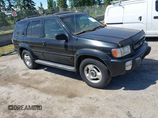 2000 Infiniti QX4 z VIN JNRAR07YXYW086691, wystawiony jako IAAI lot #42361618 z przebiegiem 234 940 mil mil oraz . Historia ofert i sprzedaży dostępna na DreamBid. Obrazek 1.