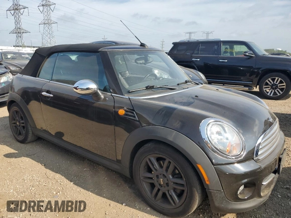 2011 MINI Convertible with VIN WMWZN3C57BT133547, listed as a Copart auction lot 64819375 with Not provided miles and Clean title. Bid and sale history available at DreamBid. Image 4.