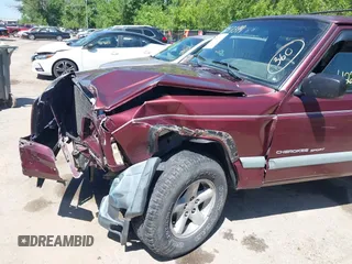 2001 Jeep Cherokee Sport with VIN 1J4FF48S51L516712, listed as a IAAI auction lot 42247399 with 323,576 mi miles and . Bid and sale history available at DreamBid. Image 18.