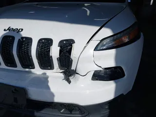 2016 Jeep Cherokee Sport z VIN 1C4PJLAB2GW291282, wystawiony jako IAAI lot #41579554 z przebiegiem 121 590 mil mil oraz . Historia ofert i sprzedaży dostępna na DreamBid. Obrazek 17.