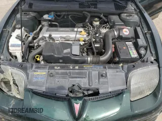2002 Pontiac Sunfire z VIN 1G2JB52F927241888, wystawiony jako Copart lot #65939404 z przebiegiem 224 388 mil mil oraz Szkody całkowita. Historia ofert i sprzedaży dostępna na DreamBid. Obrazek 11.